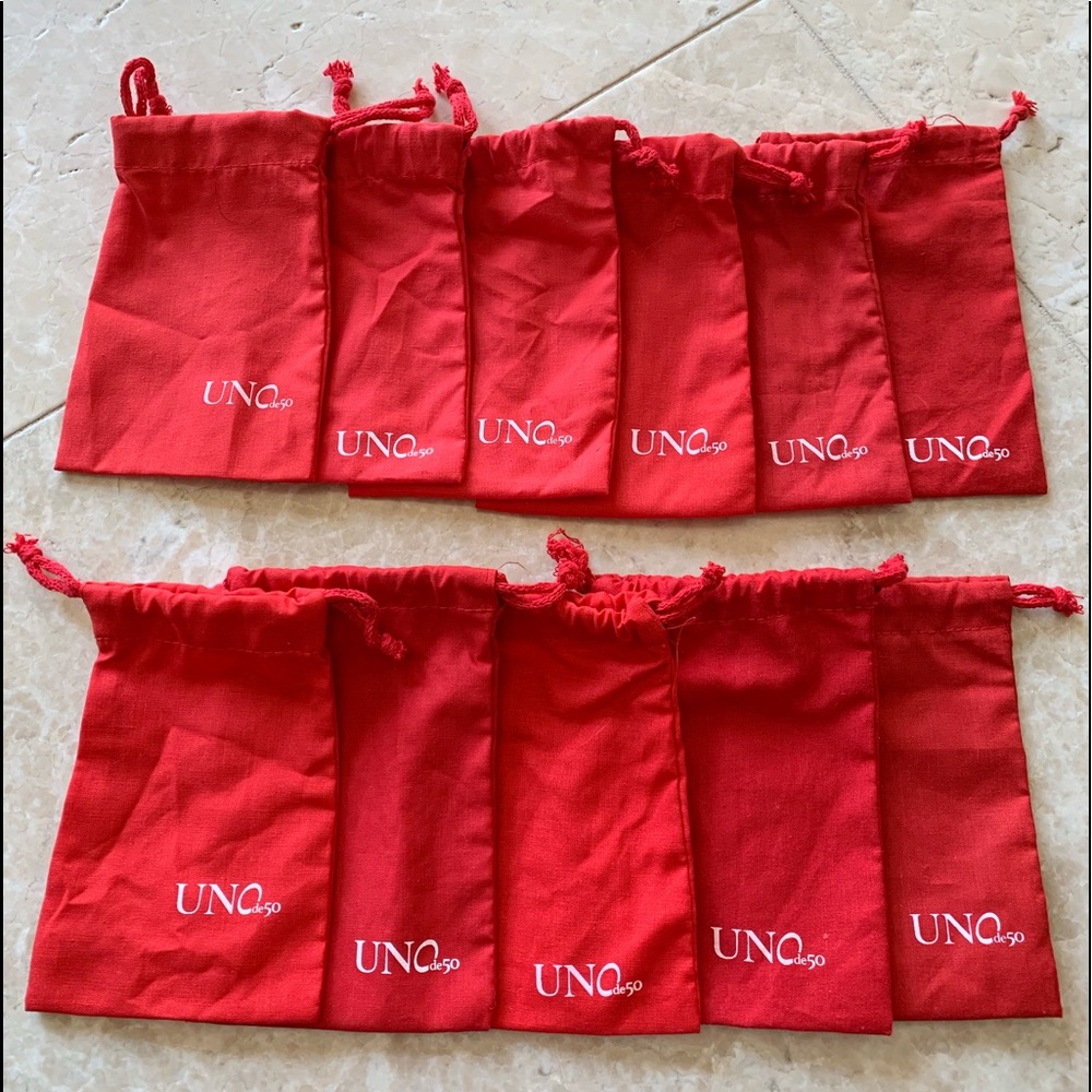 Lot of 11 MEDIUM size Uno De 50 duster bags